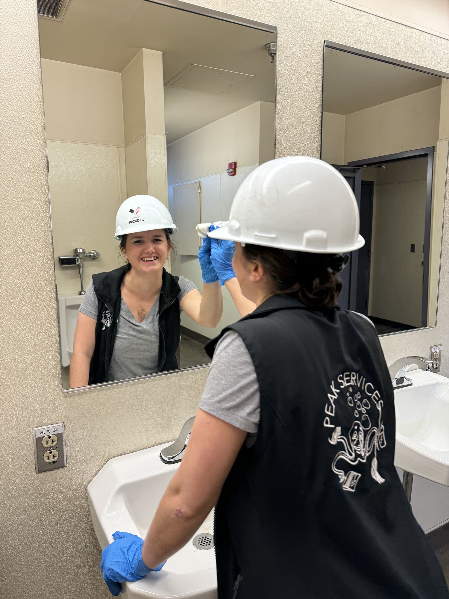 Peak Services technicians on a site inspection
